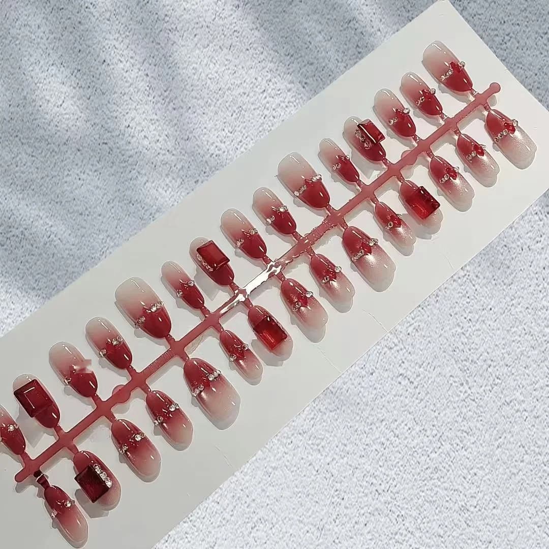 Rote Strass-Katzenaugen-Nägel zum Aufkleben, mittel oval, 30 Stück