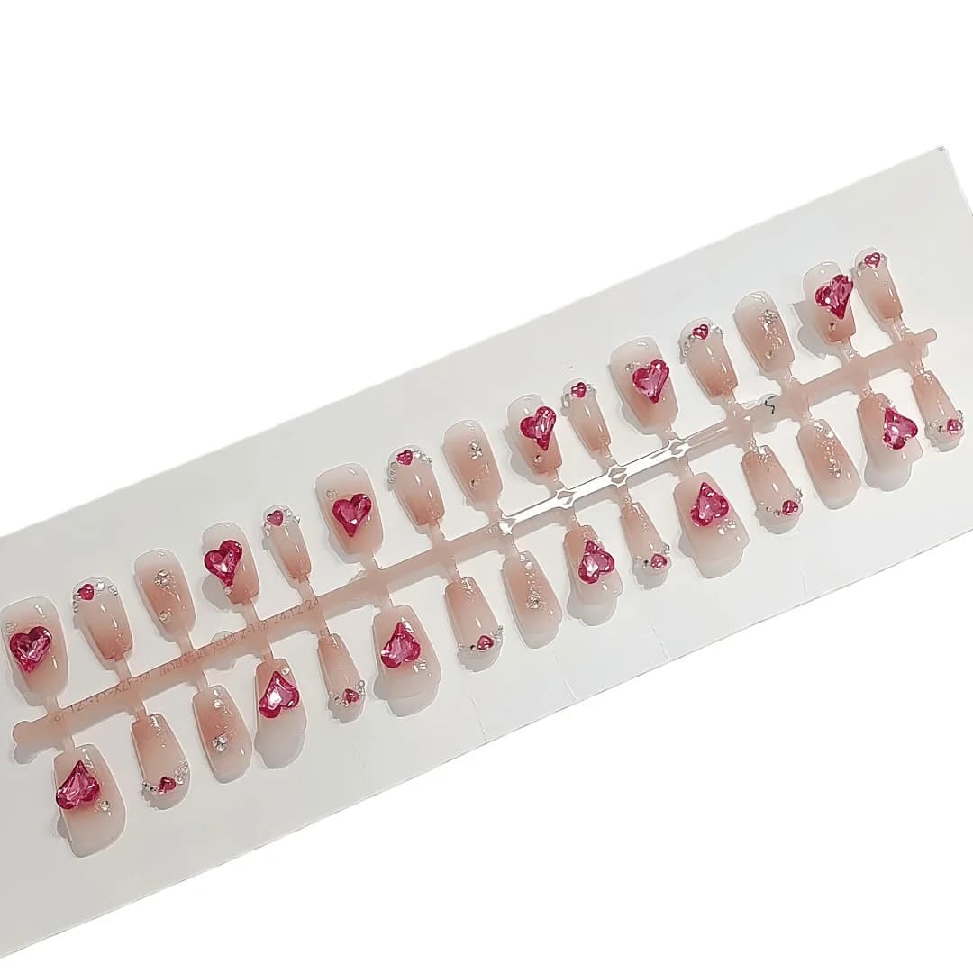 Rosa Kunstnägel mit Herz-Strasssteinen, 30 Stück